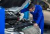 mechanic-servicing-car-engine_1170-1297 (1).jpg